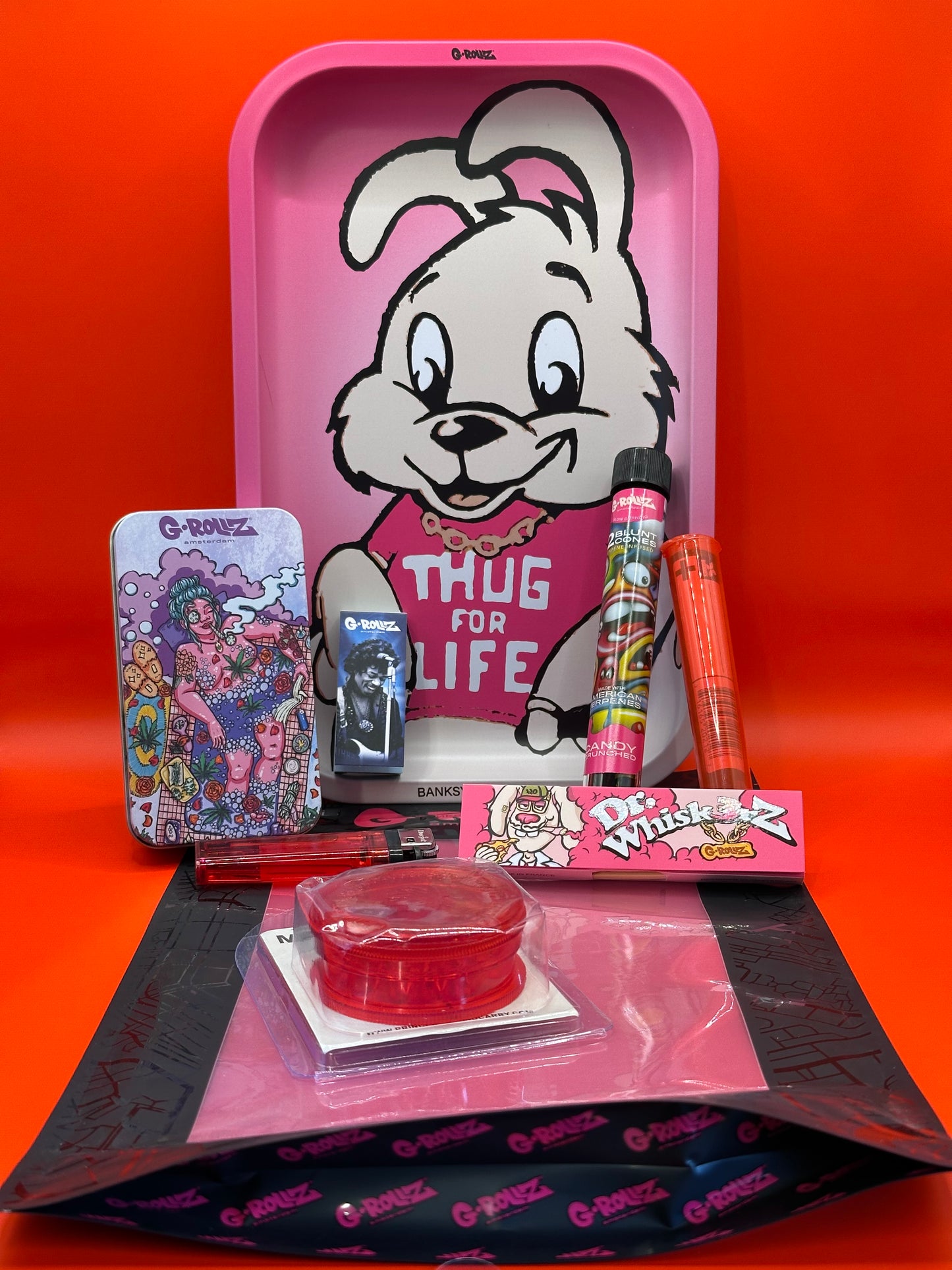 Mixed bundle, grinder, cigarette tin, lighter, roach cards, papers, blunt cones