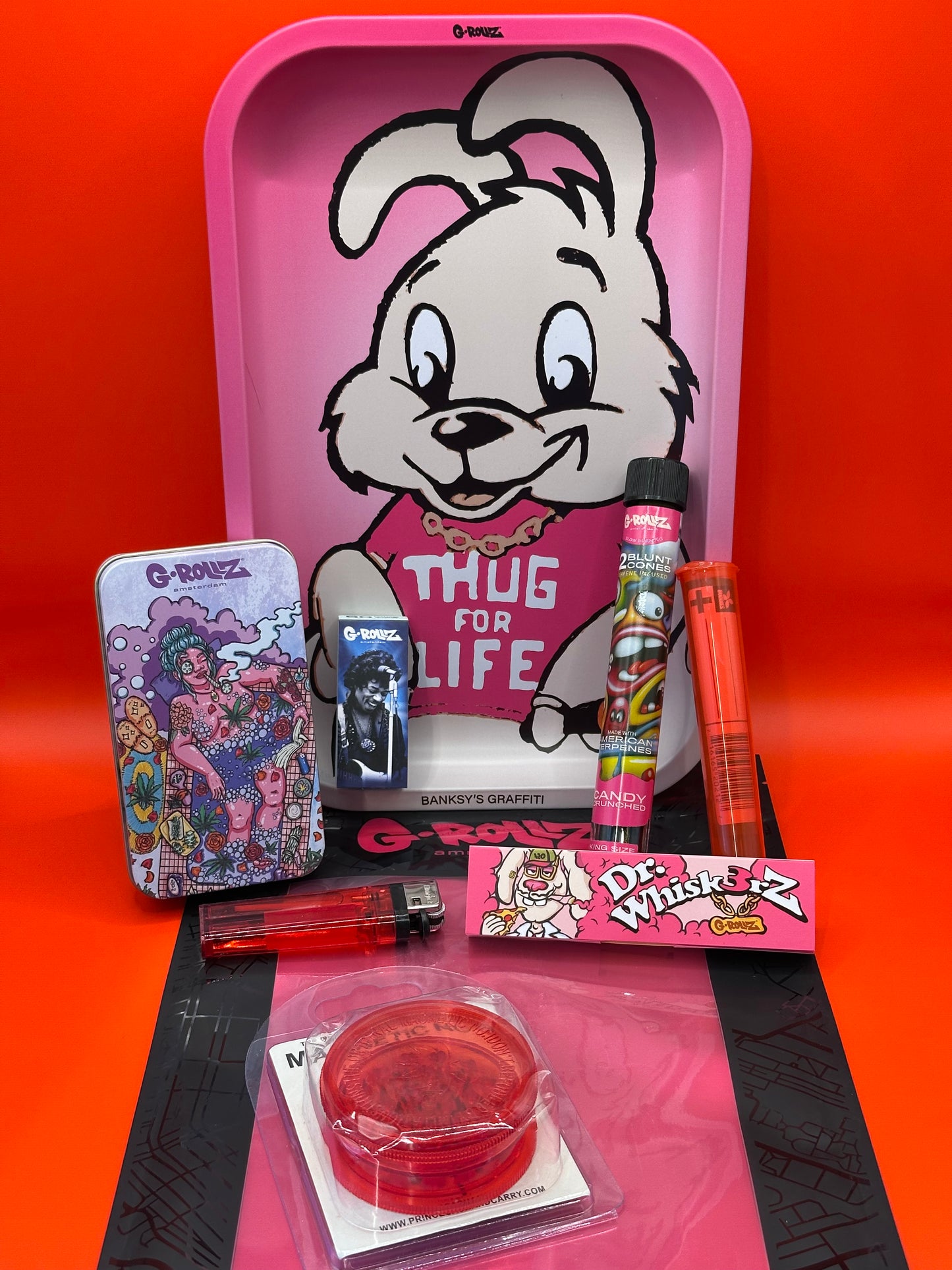 Mixed bundle, grinder, cigarette tin, lighter, roach cards, papers, blunt cones