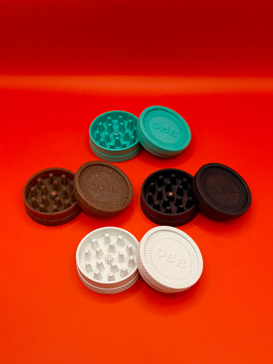 This OCB Grinder is a durable 2-part piece made from plant based composite material. Compact, lightweight, and easy to use, it is designed for smooth grinding and everyday reliability.