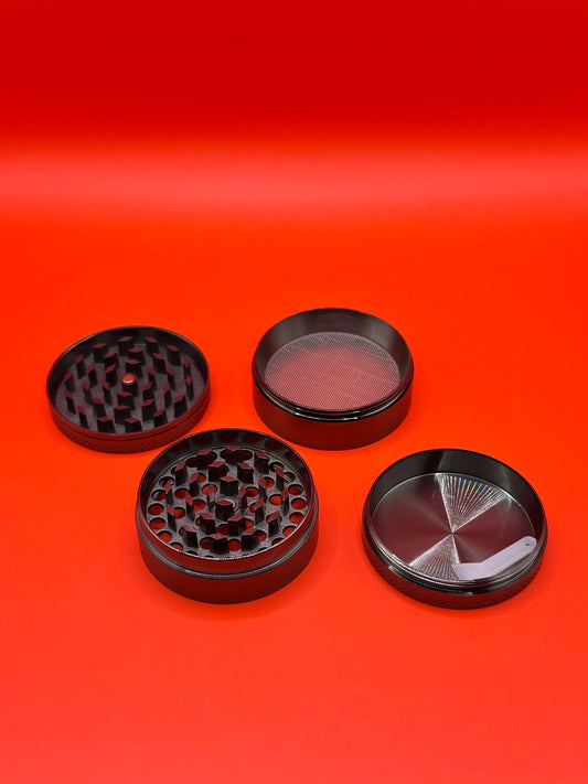 55mm shiny Metal Grinder with kief collector and scoop.