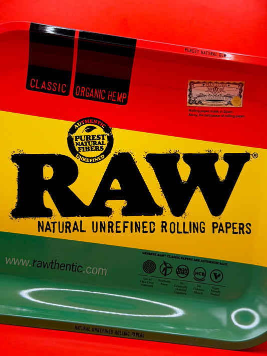 The RAW Rasta Metal Rolling Tray is a bold and practical tray with the classic RAW look and a colourful rasta style design. It gives you a clean space to roll, organise your setup, and keep everything in one place.
