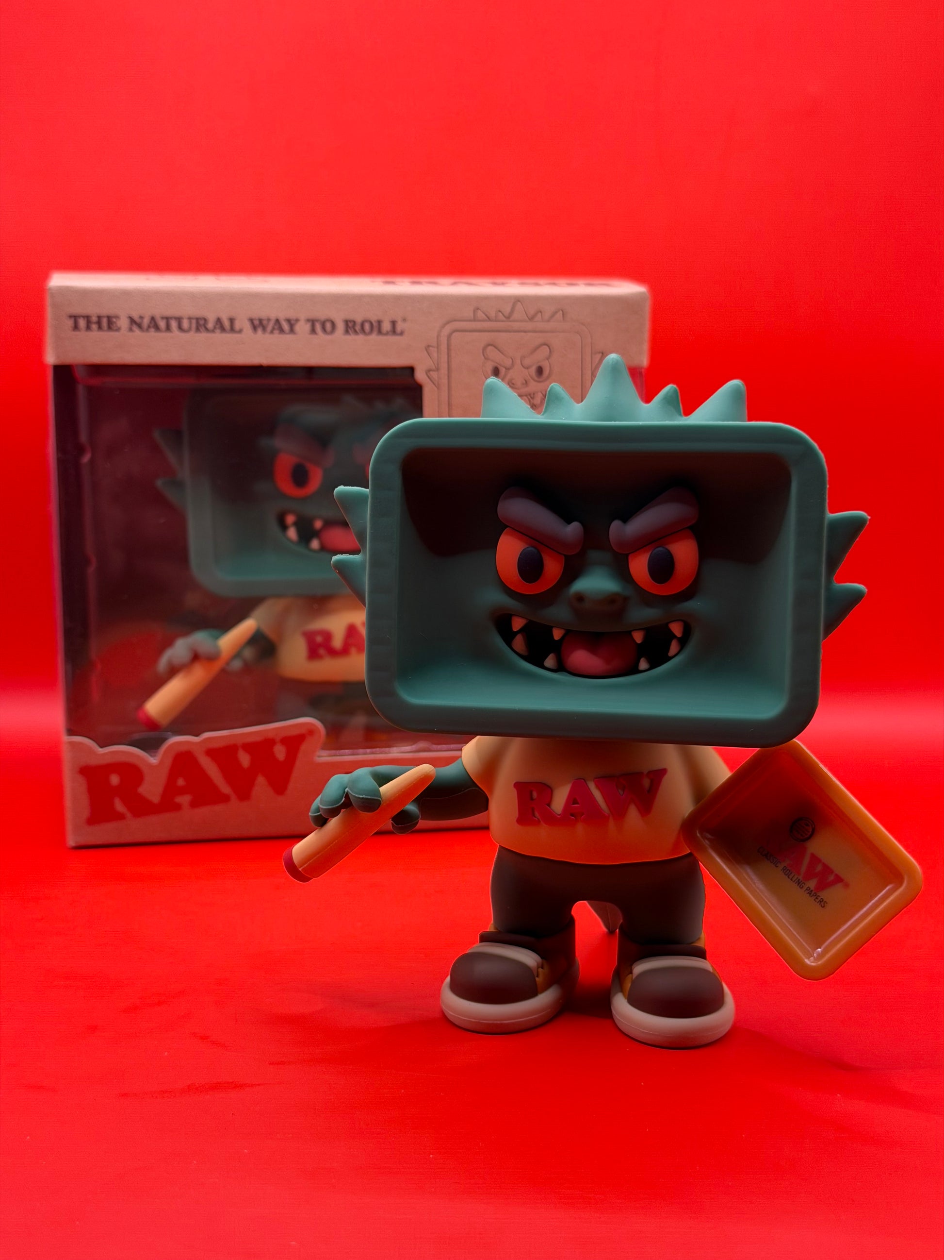 The Exclusive RAW Traysor Rare Figurine is a limited edition collector’s piece made for RAW fans who want something different for their setup. With its bold character design and RAW branding, it works as a standout display item for desks, shelves, counters, or rolling stations.